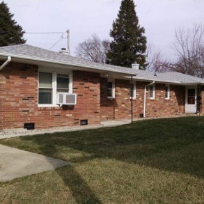 Attractive brick duplex home